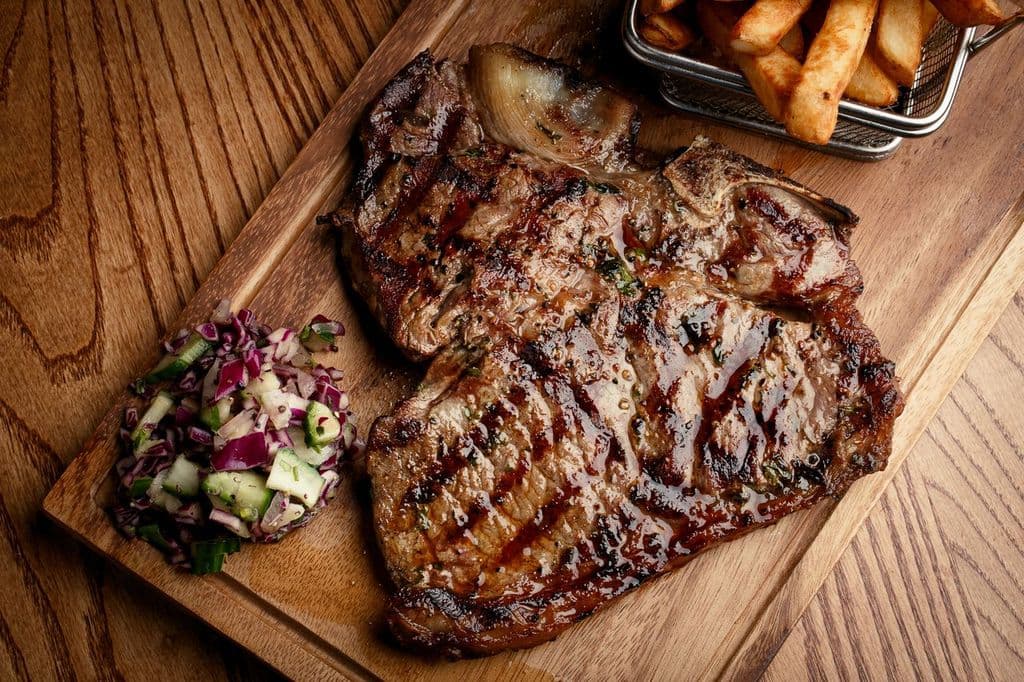 Complete steak dinner plate with sides